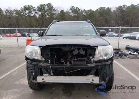 2009 Toyota Tacoma Base V6 из США, поврежденный, VIN 3TMLU42N69M020667